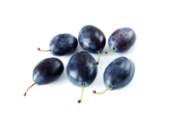  plums isolated on white background
