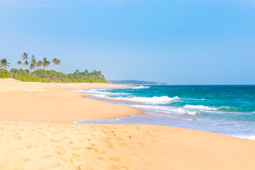 Fototapeta na wymiar The scenic Medaketiya beach in the east of Tangalle, situated in the southern province of Sri Lanka. The coastal town has a majestic bay and the most beautiful beaches in the south and south-east 