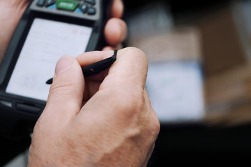Working In Warehouse With Mobile Computer