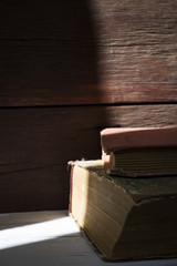 A beautiful image of two vintage books. Vertical shot
