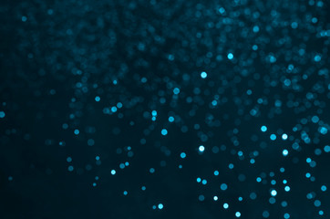 abstract glitter bokeh beautiful background in soft blue.