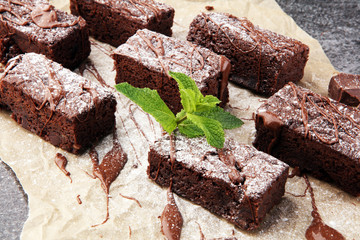 homemade chocolate brownies on grey vintage background, chocolate cake concept