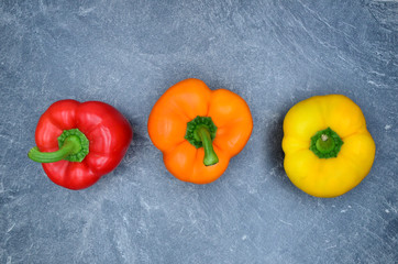 red orange yellow pepper close up photo