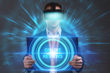 Business, Technology, Internet and network concept. Young businessman working in virtual reality glasses sees the inscription: Online reviews