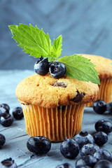 Freshly baked blueberry muffins with fresh blueberries