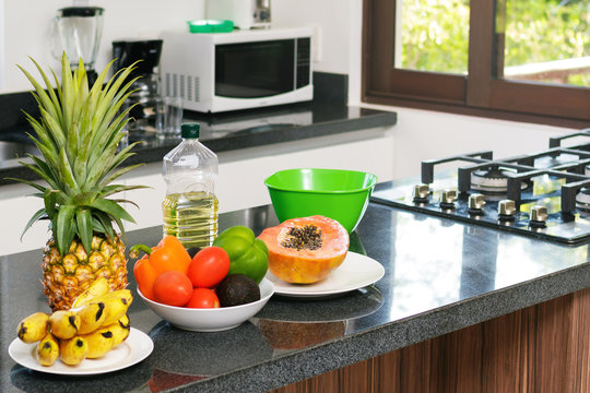 Fresh fruits and vegetables in the kitchen