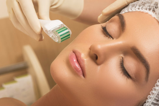 Beautiful woman in beauty salon during mesotherapy procedure.