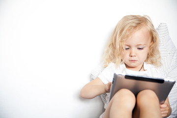 Fototapeta premium Child using tablet computer