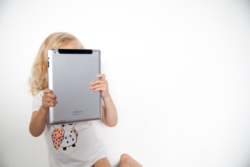 Child using tablet computer