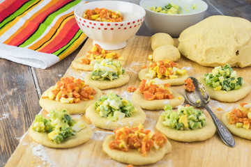 Ingredients for pie bites with egg and vegetable filling.