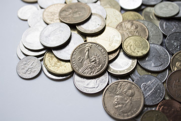 Many different coins in a single image.