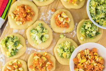 Ingredients for pie bites with egg and vegetable filling.