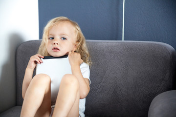 Child using tablet computer