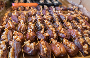walnuts filled dates for sale at local farmers market
