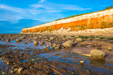 Chalk and brownstone cliffs on the beach in Hunstanton, Norfolk UK