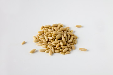 Isolated pile of pine nute on white background