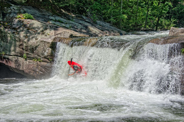 Baby falls on the Telico river in east Tennessee with a kayak going over the falls