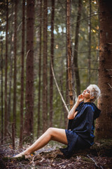 women resting in the deep fabulous forest