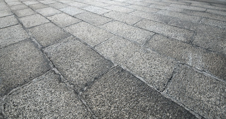 Perspective View of Monotone Gray Brick Stone on The Ground for Street Road. Sidewalk, Driveway, Pavers, Pavement in Vintage Design Flooring Square Pattern Texture Background