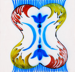 Detail of the traditional tiles from facade of old house. Decorative tiles.Spain traditional tiles. Floral ornament. 