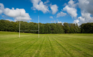 Goal post in a freshly mowed playing field