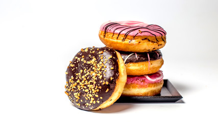 Donuts with sprinkles isolated on white background