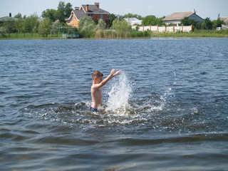children bathe in the river