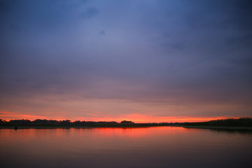 Fototapeta na wymiar Sunset on river 