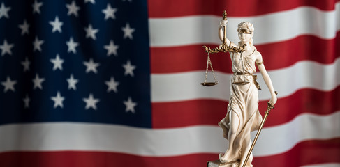 Lady Justice. USA flag background