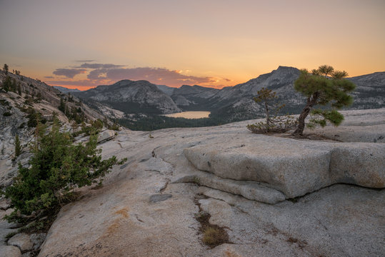 Sunrise over the granite peaks flanking Tenaya Lake in Yosemite National Park