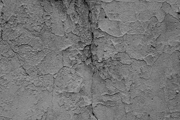 Wall fragment with scratches and cracks