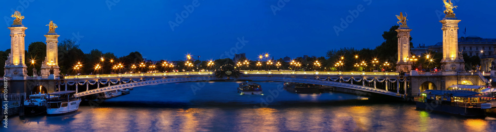 Poster the alexandre iii bridge at night in paris, france