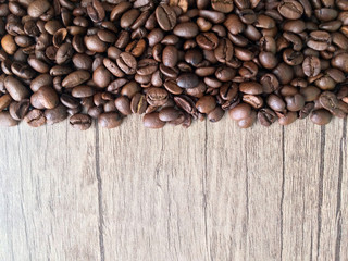 i coffee beans on the wooden floor.background,drink, 