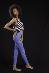 Pensive Black woman standing