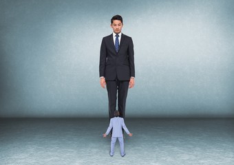 Fototapeta premium Scared small business man looking at a big business man