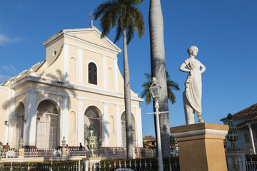 Startue in front of the Church of the Holy Trinity in Trinidad, Cuba