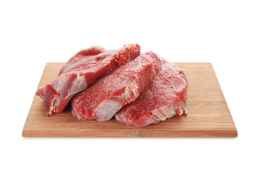 Wooden board with fresh raw meat on white background