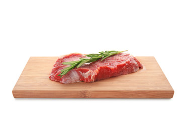 Wooden board with fresh raw meat and rosemary on white background