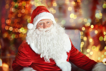 Kind authentic Santa Claus on blurred background