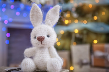 Cute toy for baby in decorated room for Christmas