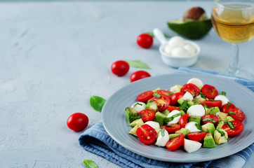 Avocado mozzarella tomato Basil salad