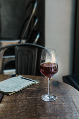 Black pour over coffee in wine glass