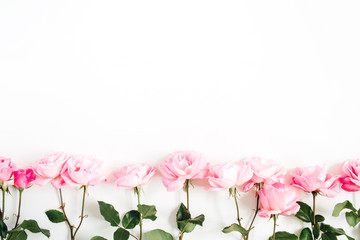 Pink roses on white background. Flat lay, top view. Valentine's background. Floral pattern. Pattern...