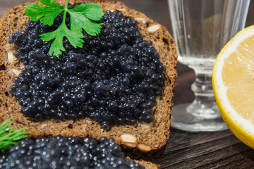 Fresh caviar for snacks and alcohol. Russian appetizer.