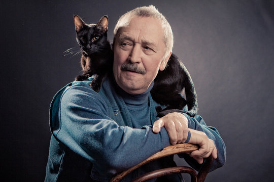 Portrait Of Wise Man With Cat