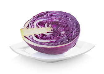 Purple cabbage slice in white plate on white background