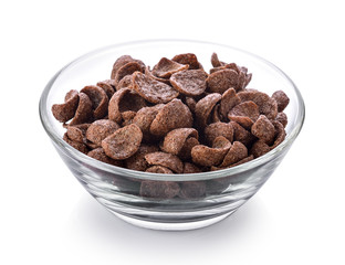 Chocolate corn flakes in a bowl on white background
