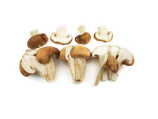 Fototapeta premium Fresh sliced champignon mushrooms isolated on white background