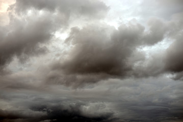 Obraz premium Dark ominous grey storm clouds.