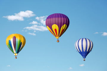 Fototapeta na wymiar Hot air balloons up in the blue sky